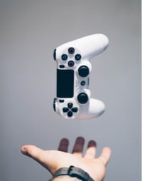 A gaming console suspended in mid-air